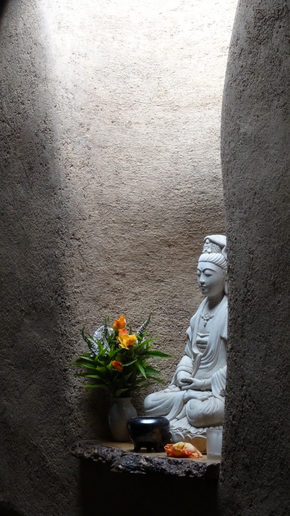 Sitting Buddha in profile