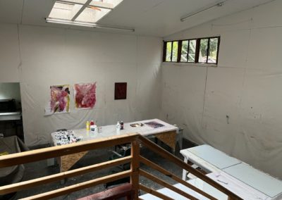 Photo of art studio tables in the lower Loft building at OHCA.
